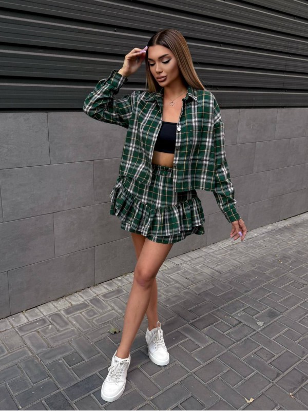Жіночий костюм зі спідницею в клітку зеленого кольору 34046