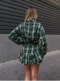 Жіночий костюм зі спідницею в клітку зеленого кольору 34046