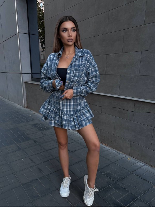 Жіночий костюм зі спідницею в клітку синього кольору 34048