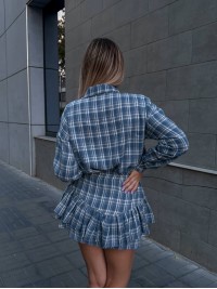 Жіночий костюм зі спідницею в клітку синього кольору 34048