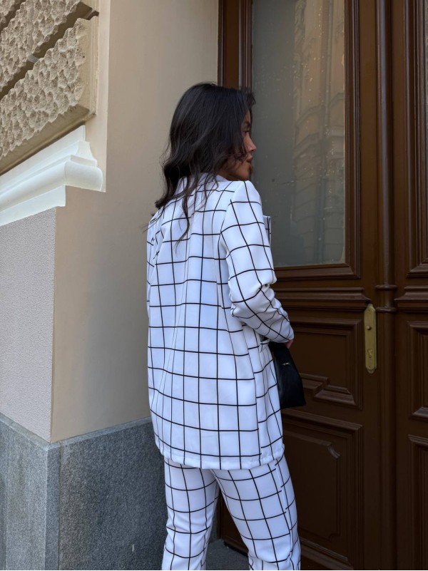Стильний жіночий костюм в клiтину молочного кольору 34081