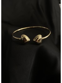 Браслет манжет Сердечки золотого кольору 34385