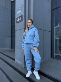 Жіночий теплий костюм з капюшоном блакитного кольору 34512