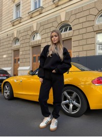 Жіночий теплий костюм з капюшоном чорного кольору 34518