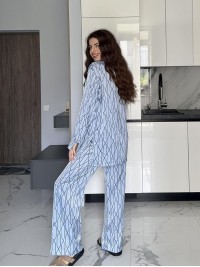 Жіночий шовковий костюм блакитного кольору 34687