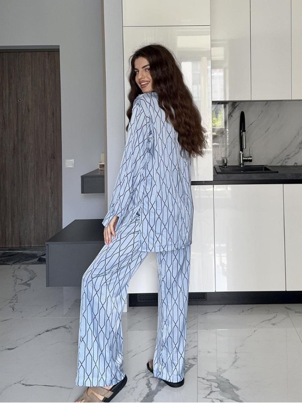 Жіночий шовковий костюм блакитного кольору 34687