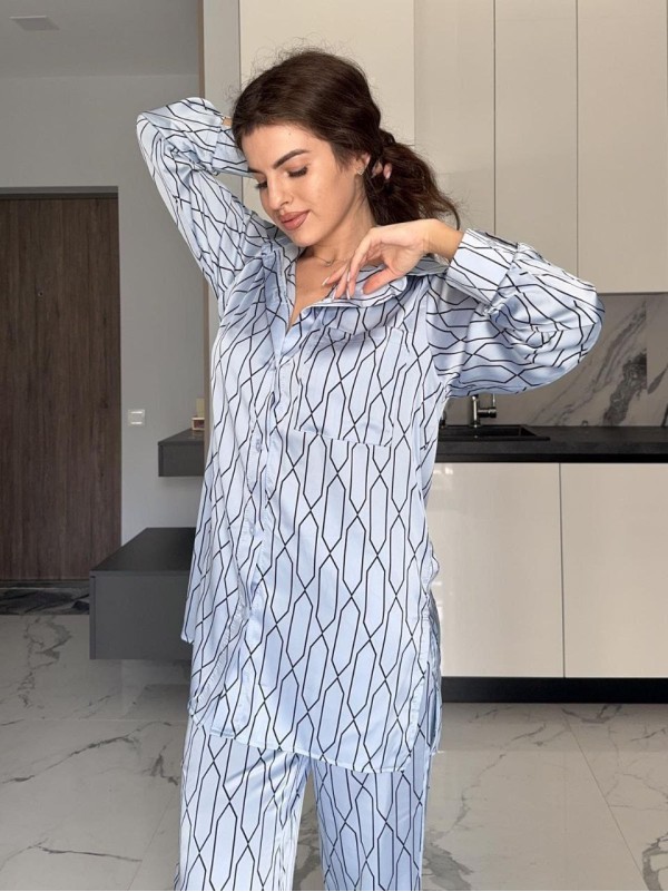 Жіночий шовковий костюм блакитного кольору 34687