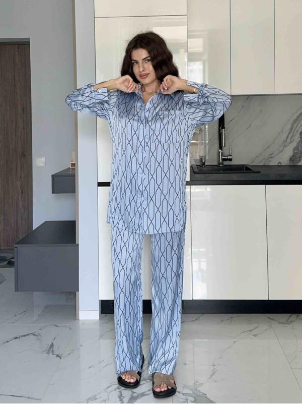 Жіночий шовковий костюм блакитного кольору 34687