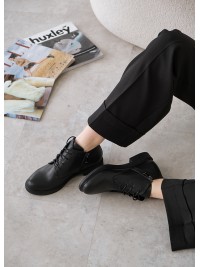 Жіночі короткі шкіряні черевики чорного кольору на шнурівці 34834