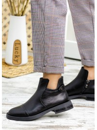 Жіночі шкіряні короткі черевики на байці чорного кольору 34897