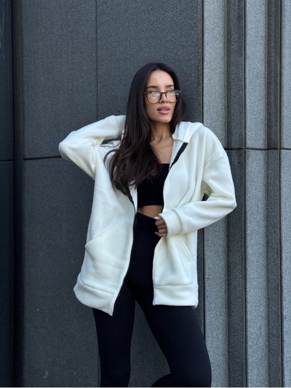 Жіноча тепла кофта на змiйцi вiльного крою молочного кольору 34937