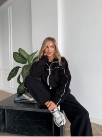 Жіночий флiсовий костюм на змiйцi чорного кольору 34945