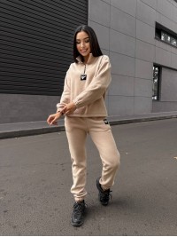 Жіночий костюм флісовий бежевого кольору 35079