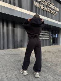 Жіночий теплий костюм на змiйцi чорного кольору 35200