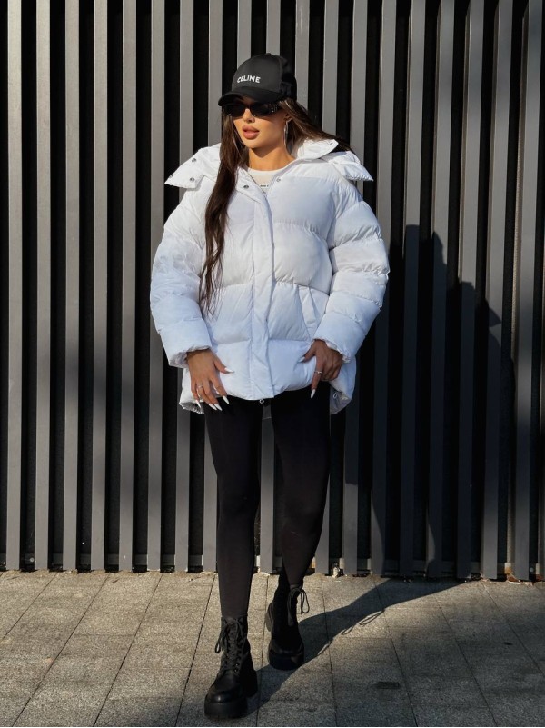 Жіночий зимовий пуховик молочного кольору 35257