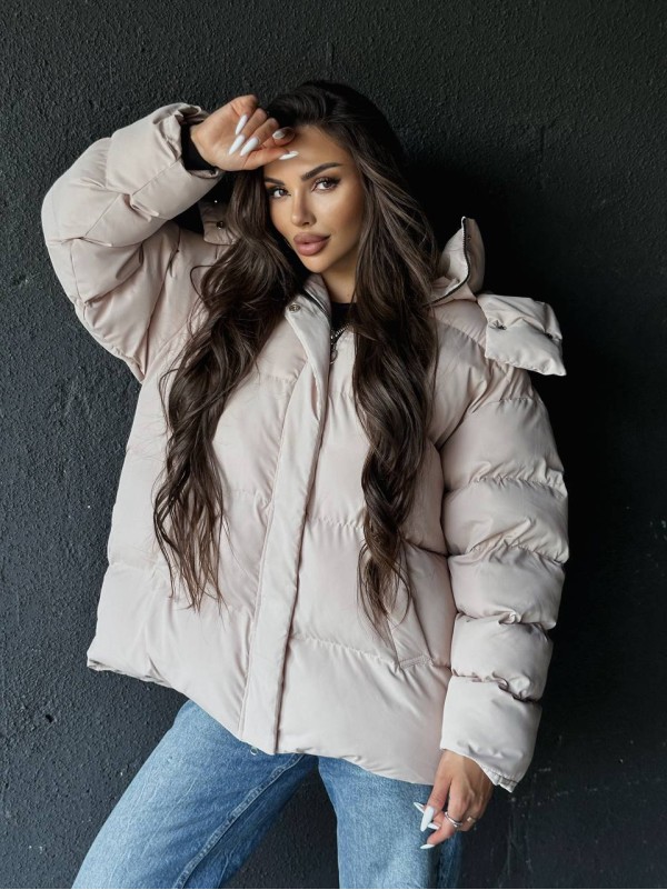 Жіночий зимовий пуховик бежевого кольору 35260