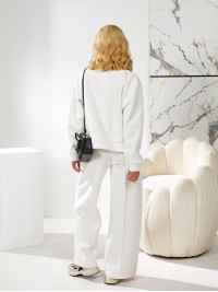 Жiночий теплий костюм на змiйцi молочного кольору 35487