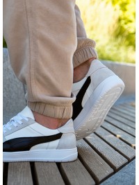 Кросівки чоловічі з натуральної шкіри білого кольору 35546