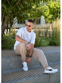 Кросівки чоловічі з натуральної шкіри білого кольору 35546