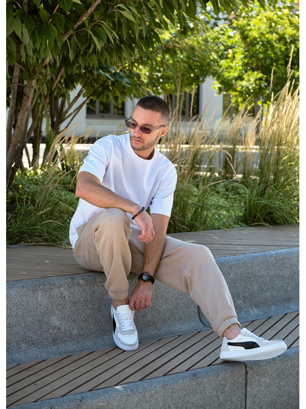 Кросівки чоловічі з натуральної шкіри білого кольору 35546