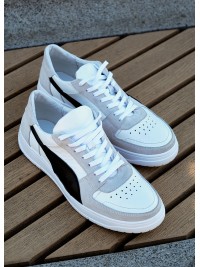 Кросівки чоловічі з натуральної шкіри білого кольору 35546