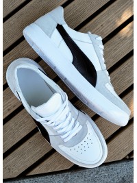 Кросівки чоловічі з натуральної шкіри білого кольору 35546