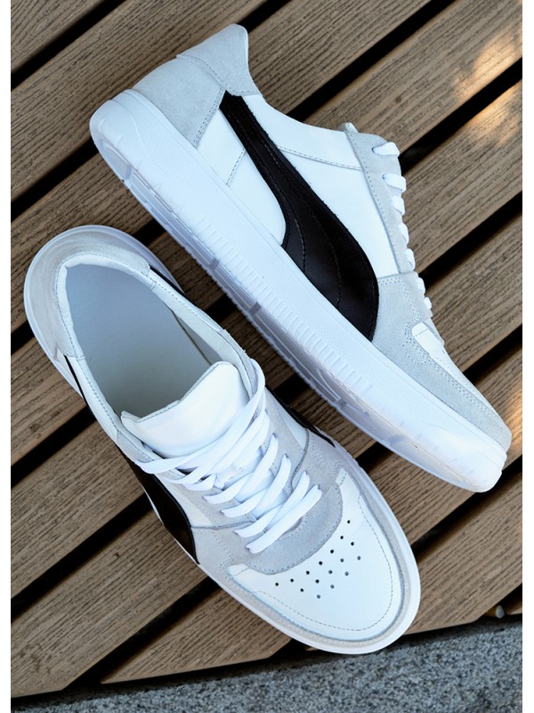 Кросівки чоловічі з натуральної шкіри білого кольору 35546