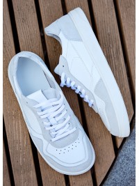 Шкіряні чоловічі кросівки з вставками білого кольору 35548