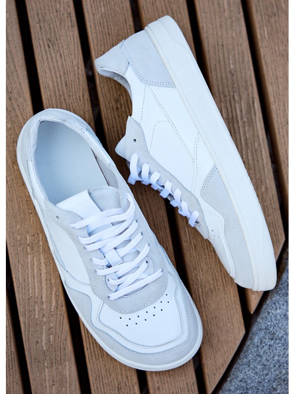 Шкіряні чоловічі кросівки з вставками білого кольору 35548