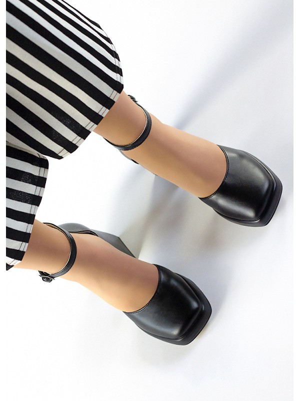 Жіночі шкіряні туфлі на каблуку чорного кольору 35568