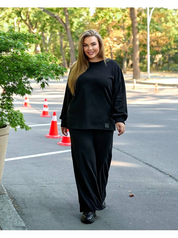Жіночий прогулянковий костюм з теплого трикотажу чорного кольору 35573