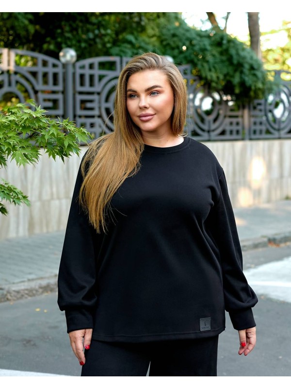 Жіночий прогулянковий костюм з теплого трикотажу чорного кольору 35573