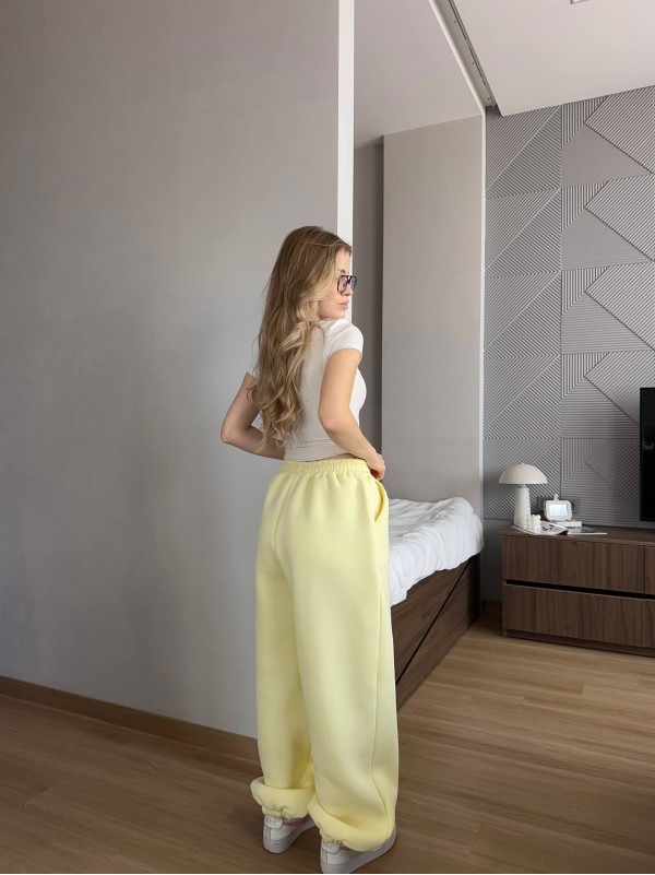 Жiночi широкi штани на флiсi жовтого кольору 35708