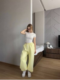 Жiночi широкi штани на флiсi жовтого кольору 35708