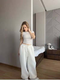Жiночi широкi штани на флiсi молочного кольору 35711