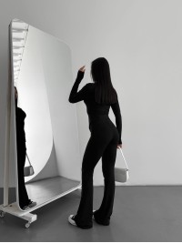 Жіночі штани кльош на флiсi чорного кольору 35712