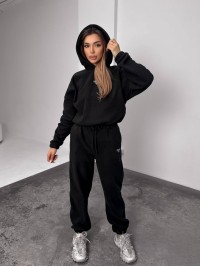 Жіночий костюм флісовий з капюшоном чорного кольору 35899