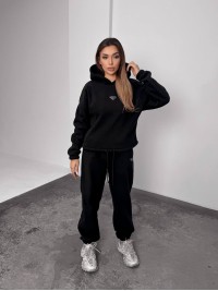 Жіночий костюм флісовий з капюшоном чорного кольору 35899