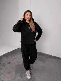 Жіночий костюм флісовий з капюшоном чорного кольору 35899