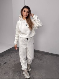 Жіночий костюм флісовий з капюшоном молочного кольору 35901