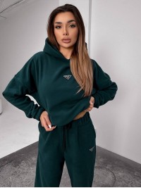 Жіночий костюм флісовий з капюшоном зеленого кольору 35902