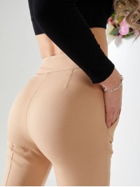 Штани бежевого кольору 24336