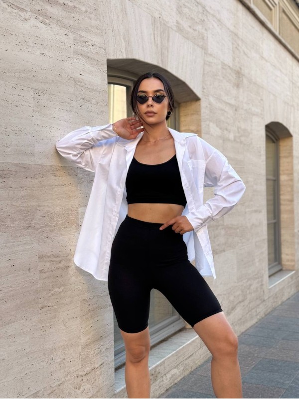 Жіноча сорочка з манжетами на ґудзиках білого кольору 28288