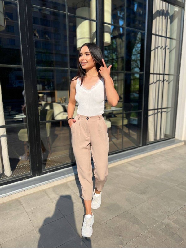 Стильні жіночі штани бежевого кольору 28959