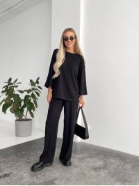 Жіночий прогулянковий костюм вільного крою чорного кольору 29210