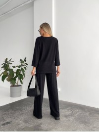 Жіночий прогулянковий костюм вільного крою чорного кольору 29210