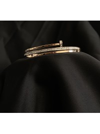 Браслет - манжет Цвях золотого кольору 33576