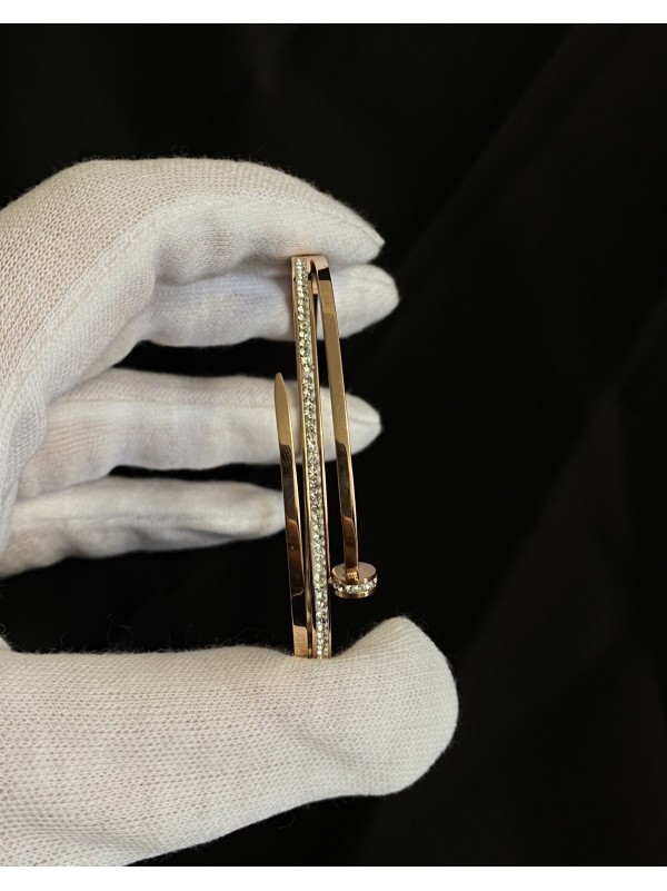 Браслет - манжет Цвях золотого кольору 33576